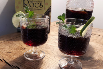 Cocktail met vlierbessensap, appelsap en cava